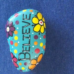 One of a kind hand painted rock.